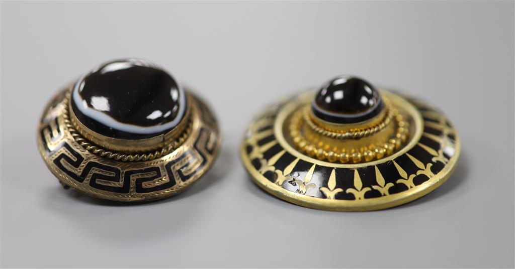 A Victorian yellow metal, enamel and cabochon banded agate set mourning pendant brooch, 30mm & 1 other.